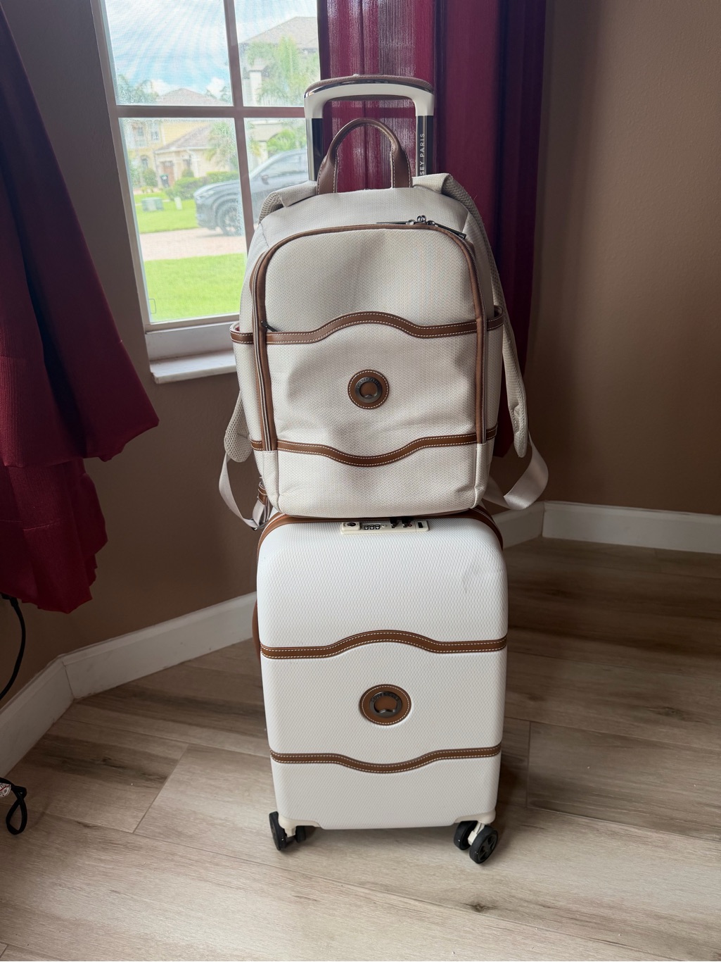 Delsey Paris Chatelet 2.0. Cream And Tan Rolling Luggage Set